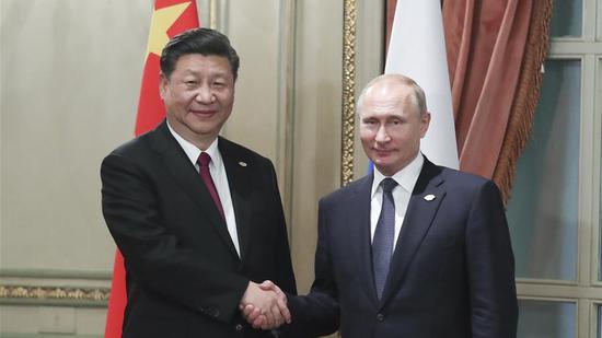 Chinese President Xi Jinping meets with his Russian counterpart Vladimir Putin in Buenos Aires, Argentina, November 30, 2018. (Photo/Xinhua)