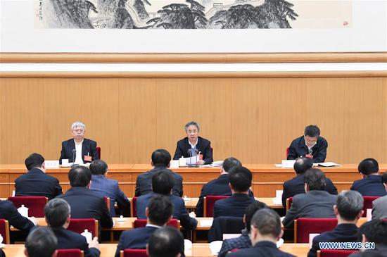 Hu Chunhua (C Back), a member of the Political Bureau of the Communist Party of China Central Committee and head of the State Council Leading Group of Poverty Alleviation and Development, speaks at a national meeting on poverty alleviation and development in Beijing, capital of China. The meeting was held in Beijing from Dec. 27 to 28, 2018. (Xinhua/Shen Hong)