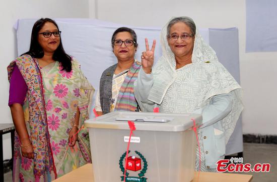 Prime Minister Sheikh Hasina gestures after casting her vote in the morning during the general election in Dhaka, Bangladesh, December 30, 2018. (Photo/Agencies)