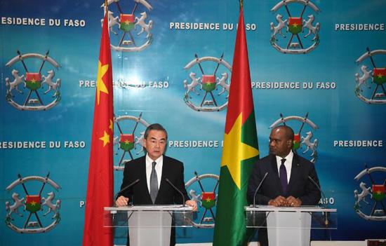 Chinese State Councilor and Foreign Minister Wang Yi (L) and Burkina Faso's Foreign Minister Alpha Barry attend a press conference in Ouagadougou, Burkina Faso, Jan 4, 2019. (Photo/Xinhua)