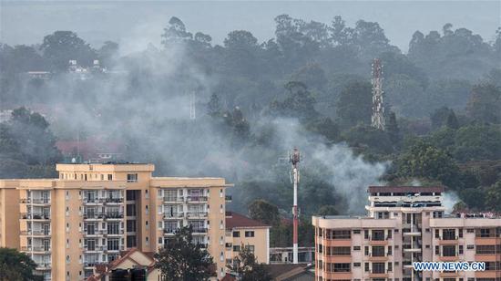 Smoke rises from the blast area after an attack at an upmarket hotel and office complex in Nairobi, Kenya, on Jan. 15, 2019. At least three people have been confirmed dead and several others injured following an attack at an upmarket hotel and office complex in Nairobi on Tuesday, police said. (Xinhua/Zhang Yu)