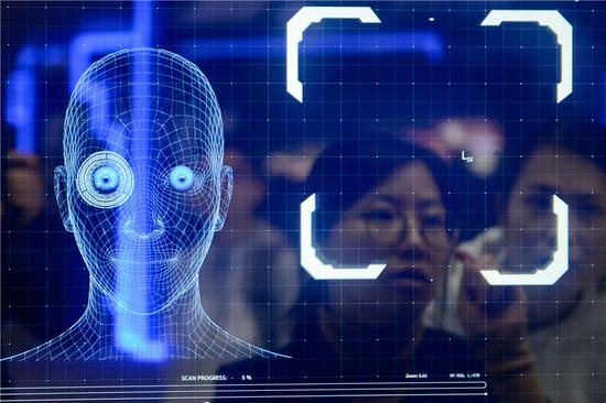 Image recognition technology is on display during an internet expo in Wuzhen, Zhejiang Province. (Photo by Tian Jianming/For China Daily)