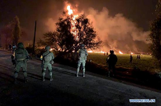 Photo taken with a mobile device shows army working at the site of an explosion in the municipality of Tlahuelilpan, Hidalgo state, Mexico, Jan 18, 2019. (Photo/Xinhua)