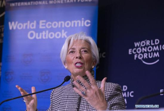 International Monetary Fund (IMF) Managing Director Christine Lagarde speaks at a press conference in Davos, Switzerland, Jan. 21, 2019. The International Monetary Fund (IMF) said Monday that global expansion has weakened and that the world's economy is expected to grow at 3.5 percent in 2019, and 3.6 percent in 2020. (Xinhua/Xu Jinquan)