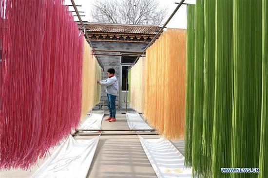 Colored noodles at workshop in Binzhou, east China's Shandong