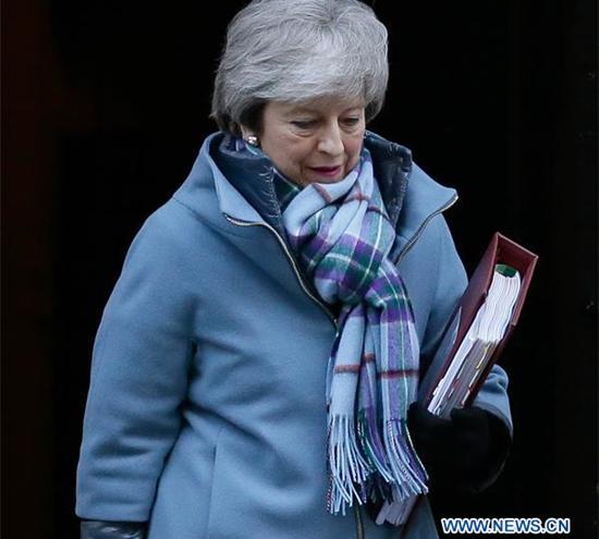 British Prime Minister Theresa May leaves 10 Downing Street for Prime Minister's Questions in the House of Commons in London, Britain, on Jan. 30, 2019. (Xinhua/Tim Ireland)