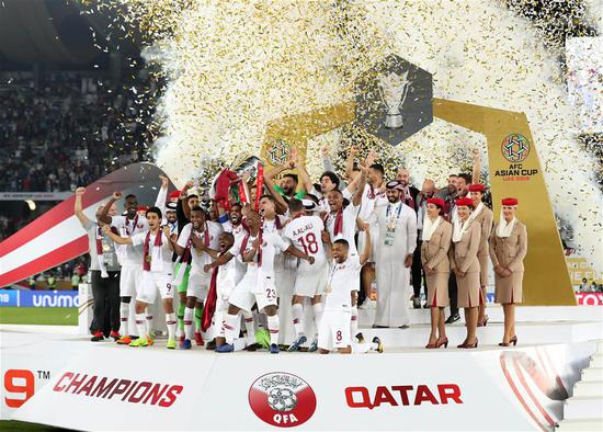 Players of Qatar celebrate on the awarding ceremony after the final match between Japan and Qatar at the 2019 AFC Asian Cup in Abu Dhabi, the United Arab Emirates (UAE), Feb. 1, 2019. (Xinhua/Li Gang)