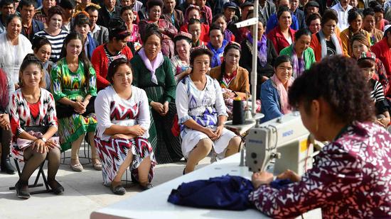 Undated photo features women in a vocational center in Xinjiang. /CGTN Photo