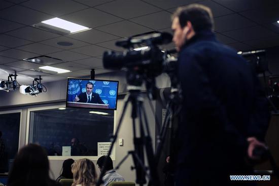 Venezuelan Foreign Minister Jorge Arreaza (on screen) speaks to journalists during a press conference at the UN headquarters in New York, on Feb. 12, 2019. (Xinhua/Li Muzi)