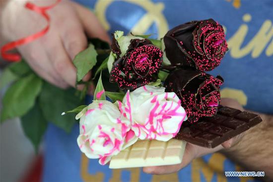 Chocolate-coated roses prepared for Valentine's Day in Croatia
