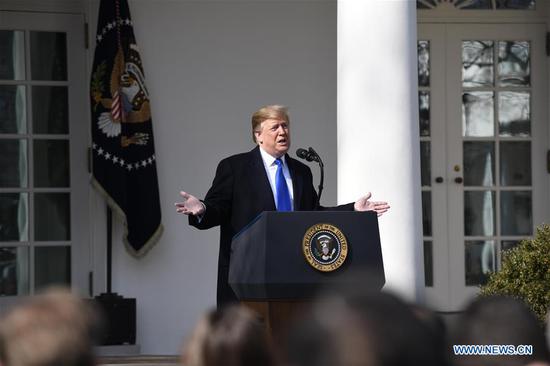 U.S. President Donald Trump speaks at the Rose Garden in the White House in Washington D.C., the United States, on Feb. 15, 2019. Trump announced Friday he will sign a national emergency to expand the U.S.-Mexico border wall and push for his signature campaign promise. (Xinhua/Hu Yousong)