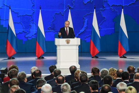 Russia's President Vladimir Putin speaks during the annual address to the Federal Assembly in Moscow, Russia, Feb. 20, 2019. The preliminary results of the implementation of Russia's national projects should be summed up in 2020, Putin said Wednesday. (Xinhua/Evgeny Sinitsyn)
