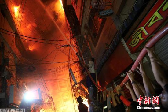 A fire that ripped through a building in Bangladesh capital Dhaka Wednesday night. (Photo/Agencies)