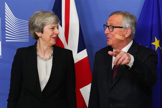 European Commission President Jean-Claude Juncker (R) meets with British Prime Minister Theresa May in Brussels, Belgium, on Feb. 20, 2019. European Commission President Jean-Claude Juncker and British Prime Minister Theresa May made fresh efforts on Wednesday to unlock the Brexit stalemate. (Xinhua/Zheng Huansong)