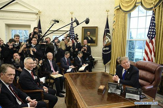 U.S. President Donald Trump (1st R) meets with Chinese Vice Premier Liu He (2nd L, front) at the Oval Office of the White House in Washington, D.C., the United States, Feb. 22, 2019. U.S. President Donald Trump on Friday met with Chinese Vice Premier Liu He at the White House on bilateral ties and the ongoing bilateral trade talks. Liu, who is a member of the Political Bureau of the Communist Party of China Central Committee and chief of the Chinese side of the China-U.S. comprehensive economic dialogue, is in Washington D.C. for the seventh round of high-level economic and trade talks between the world's top two economies that started on Thursday. He is also visiting the United States as the special envoy of Chinese President Xi Jinping. (Xinhua/Liu Jie)