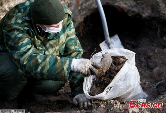 Remains of hundreds of Jews unearthed in Nazi-era mass grave in Belarus