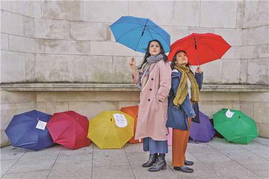 Laura Tipper (left) as Lucy and Mei Mac as Wei in Under the Umbrella. （Photo provided to China Daily）