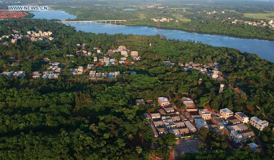 Aerial photo taken on May 30, 2018 shows the Yunlong Township in Haikou City, south China's Hainan Province.  (Xinhua/Zhao Yingquan)