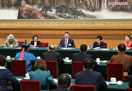 Chinese President Xi Jinping, also general secretary of the Communist Party of China (CPC) Central Committee and chairman of the Central Military Commission, attends a panel discussion with his fellow deputies from Inner Mongolia Autonomous Region at the second session of the 13th National People's Congress in Beijing, capital of China, March 5, 2019. (Xinhua/Xie Huanchi)