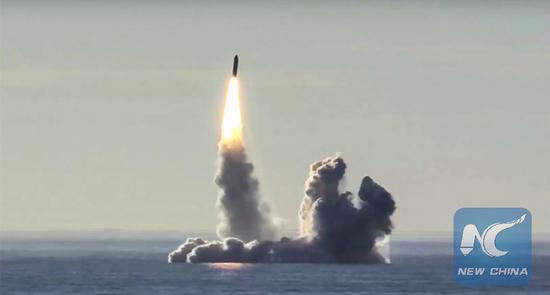 In this photo made from the footage released by the Russian Defense Ministry, Russian nuclear submarine Yuri Dolgoruky test-fires the Bulava missiles from the White Sea on May 22, 2018.