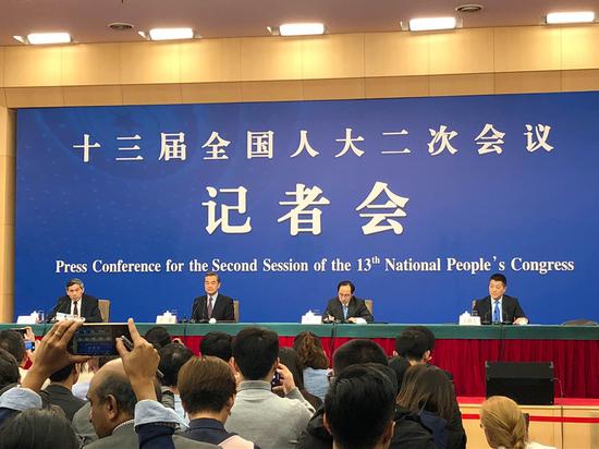 State Councilor and Foreign Minister Wang Yi speaks at a news conference on the sidelines of the annual session of the National People's Congress in Beijing, March 8, 2019. [Photo by Liu Xiaozhuo/chinadaily.com.cn]