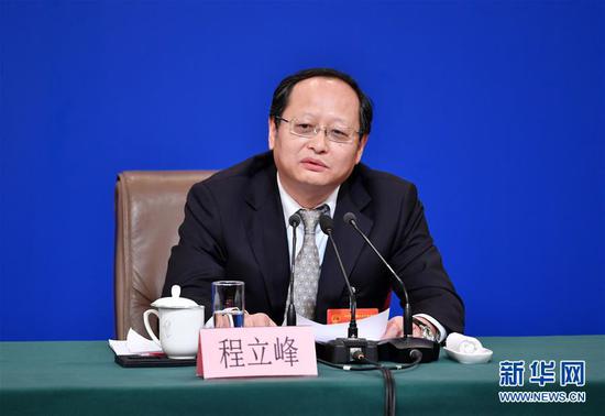 Cheng Lifeng, a member of the NPC's Natural Resource and Environmental Protection Committee speaks at a news conference on the sidelines of the annual session of the National People's Congress in Beijing, March 9, 2019. [Photo/Xinhua] 