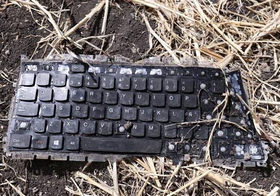 A laptop keyboard is seen at the scene of the Ethiopian Airlines Flight ET 302 plane crash, near the town of Bishoftu, southeast of Addis Ababa, Ethiopia March 11, 2019. Two flight data recorders from Ethiopian Airlines Flight ET302 were found Monday. (Photo/Agencies)