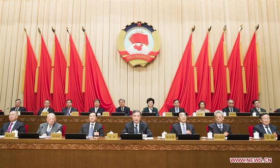 Wang Yang (C, front), a member of the Standing Committee of the Political Bureau of the Communist Party of China (CPC) Central Committee and chairman of the Chinese People's Political Consultative Conference (CPPCC) National Committee, presides over a Standing Committee meeting of the 13th CPPCC National Committee in Beijing, capital of China, March 12, 2019. (Xinhua/Huang Jingwen)