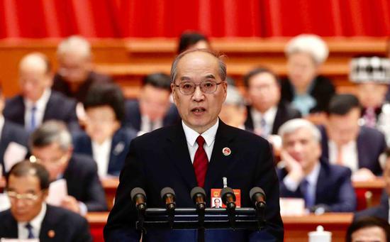 Zhang Jun, procurator-general of the Supreme People's Procuratorate, delivers a work report of the Supreme People's Procuratorate at a plenary meeting of the NPC in Beijing on March 12, 2019.(Photo by Feng Yongbin/chinadaily.com.cn)