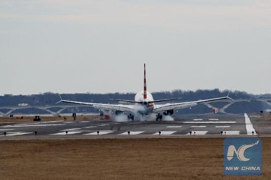 An American Airlines Boeing 737 Max 8 aircraft from Los Angeles lands at Washington Reagan National Airport in Washington D.C., the United States on March 13, 2019. (Xinhua/Ting Shen)