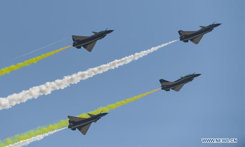 China's Bayi Aerobatic Team perform at the 12th China International Aviation and Aerospace Exhibition (Airshow China) in Zhuhai, south China's Guangdong Province, on Nov. 6, 2018. The air show opend on Tuesday.  (Photo/Xinhua)