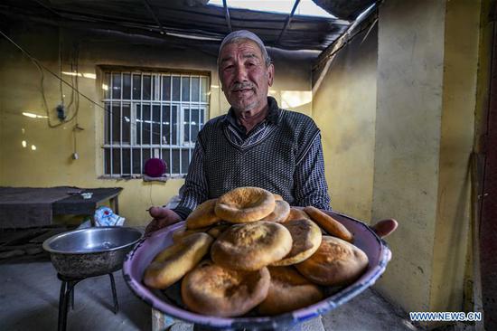 'Nang' making boosts farmers' income in Xinjiang