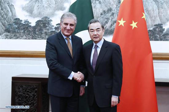 Chinese State Councilor and Foreign Minister Wang Yi (R) and Pakistani Foreign Minister Shah Mahmood Qureshi co-chair the first strategic dialogue between foreign ministers of China and Pakistan in Beijing, capital of China, March 19, 2019. (Xinhua/Liu Bin)