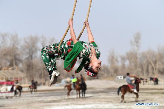 Uygur people participate in Shaghydi game in Xinjiang