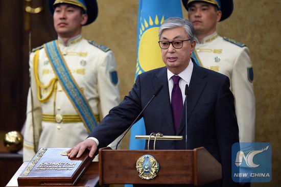 Acting President of Kazakhstan Kassym-Jomart Tokayev takes part in a swearing-in ceremony during a joint session of the houses of parliament in Astana, Kazakhstan March 20, 2019. (Photo by Kazakh Presidential Press Service)