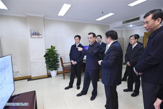 Chinese Premier Li Keqiang (2nd L) inspects the Ministry of Finance in Beijing, capital of China, March 21, 2019. (Xinhua/Yan Yan)