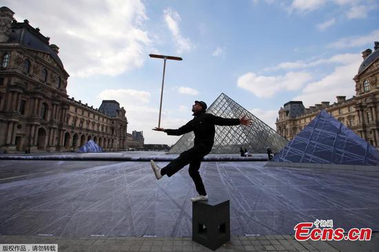 Louvre's glass pyramid set for interactive performance for 30th anniversary