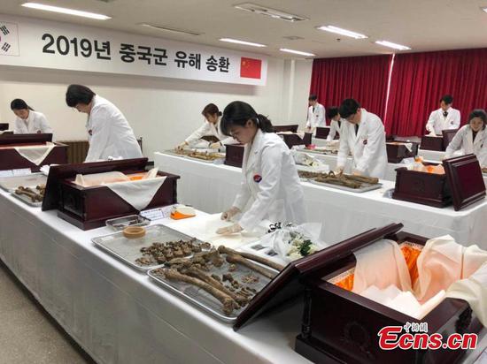 The remains of Chinese volunteer soldiers killed in the Korean War (1950-1953) are prepared before a transfer back to China in Incheon, South Korea, April 1, 2019. The handover ceremony for the remains of 10 Chinese volunteer soldiers will be held on April 3. (Photo: China News Service/Zeng Ding)