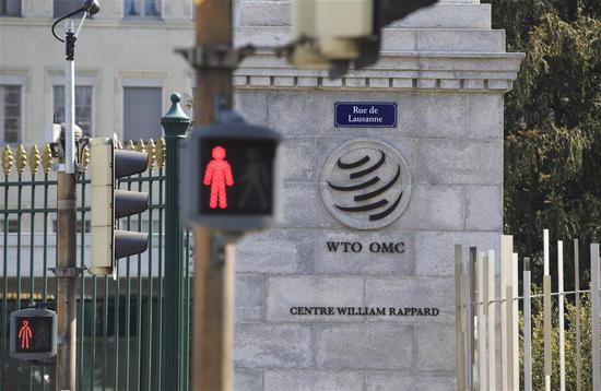 Photo taken on April 2, 2019 shows the WTO logo on the main gate of the World Trade Organization (WTO) in Geneva, Switzerland. (Xinhua/Xu Jinquan)