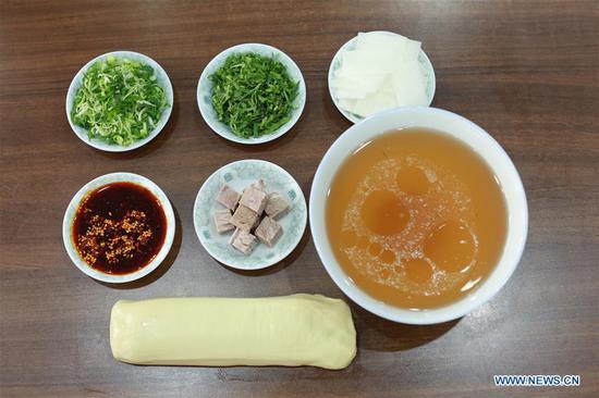 Lanzhou beef noodles wins fame both at home and abroad