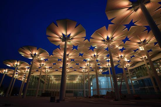 Aerial photo taken on March 26, 2019 shows the night view of International Pavilion of the International Horticultural Exhibition 2019 Beijing China (Expo 2019 Beijing) in Yanqing District of Beijing, capital of China. (Xinhua/Ju Huanzong)