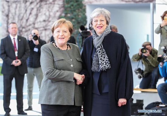 German Chancellor Angela Merkel (L) shakes hands with British Prime Minister Theresa May at the German Chancellery in Berlin, capital of Germany, on April 9, 2019. British Prime Minister Theresa May visited Berlin on Tuesday to discuss a way out of the deadlock of the Brexit process with German Chancellor Angela Merkel. (Xinhua/Shan Yuqi)