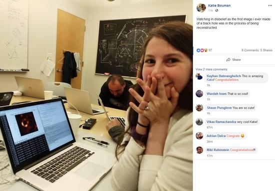 Katie Bouman smiles while the image of the black hole is processed. /MIT Photo