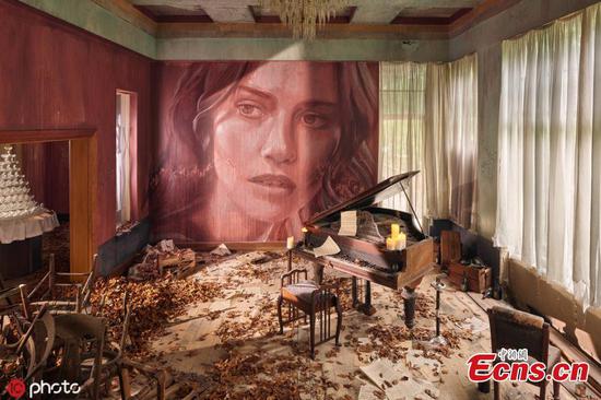 Artist turns abandoned house into installation called Empire