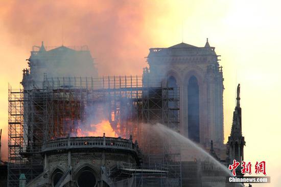 Smoke rises from the Notre Dame Cathedral in central Paris, capital of France, on April 15, 2019. A blaze broke out on Monday afternoon at the Notre Dame Cathedral in central Paris where firefighters were still fighting to put the fire under control, Paris Mayor Anne Hidalgo said. (Photo/Agencies)