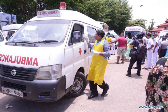 Ambulances are seen outside a hospital in Negombo, north of Colombo, Sri Lanka, April 21, 2019. (Xinhua/Samila)