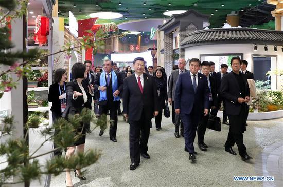 Chinese President Xi Jinping and his wife Peng Liyuan are joined by foreign leaders and their spouses for a tour of the International Horticultural Exhibition 2019 Beijing in Yanqing District of Beijing, capital of China, April 28, 2019. (Xinhua/Ding Haitao)