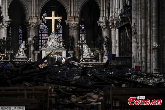 Rubble and the cross inside the Notre Dame de Paris Cathedral, Wednesday May 15, 2019 in Paris. (Photo/Agencies)