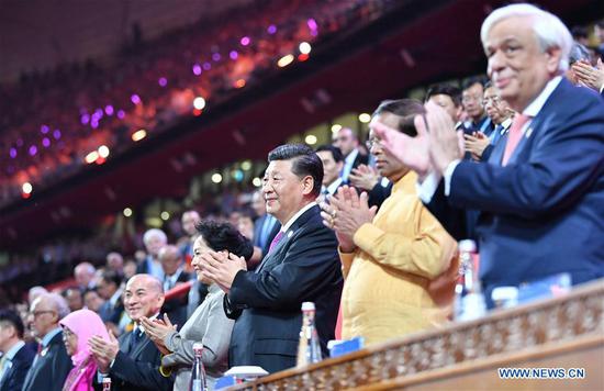 Chinese President Xi Jinping and his wife Peng Liyuan attend the Asian culture carnival, a major event of the ongoing Conference on Dialogue of Asian Civilizations, together with foreign guests at the National Stadium in Beijing, capital of China, on May 15, 2019. (Xinhua/Yin Bogu)