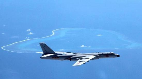 File photo of a Chinese H-6k bomber patrolling Huangyan island in July 2016. /Xinhua Photo